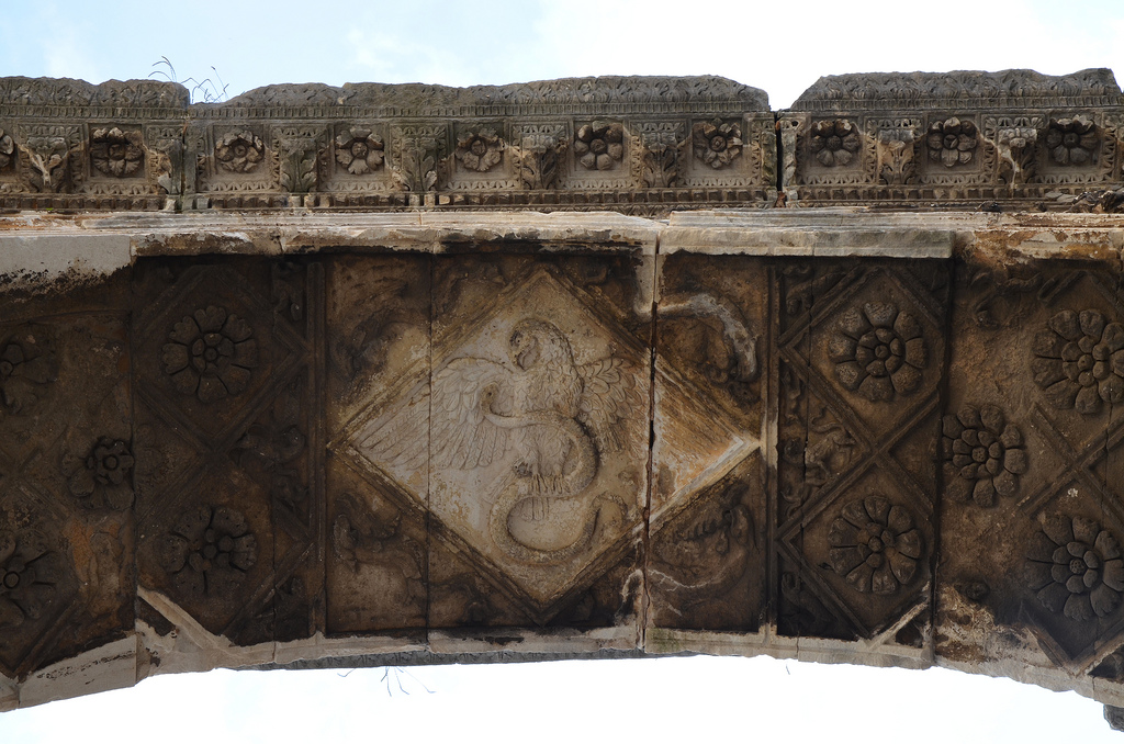 Detail of the Arch of the Sergii. Central arch relief depicting a scene of an eagle fighting a snake.