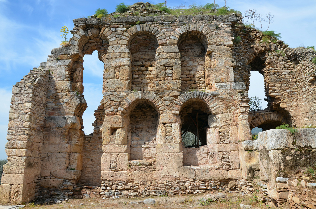  It apparently had three stories, but the lowest is now mostly buried and the highest almost entirely destroyed. The plan of the middle story is recognizable, and shows the usual separation of the bookshelves from the outer wall to protect them from damp.