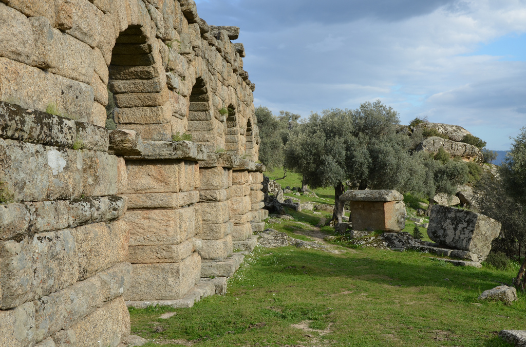 The aqueduct and sarcophagus from the late Classical necropolis.