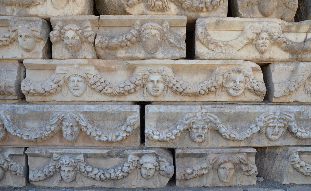 Friezes with theatre masks and portrait heads of various gods and goddesses linked by garlands, they adorned the 1st century AD Portico of Tiberius.