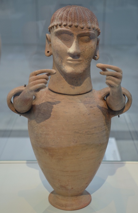 Etruscan cinerary urn with a female head and articulated arms, from Chiusi (Italy), around 550-500 BC.