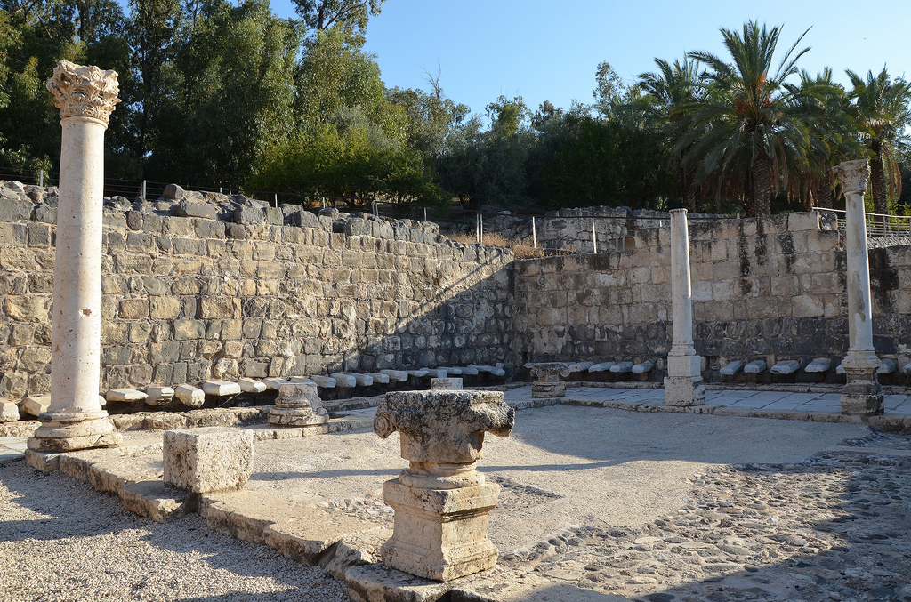 The public latrines with open courtyard paved and a mosaic floor.