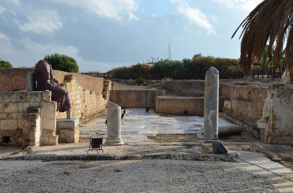 A section of a Byzantine street paved with opus sectile and mosaics, the statues are older dating to the 2nd and 3rd century AD, they originally belonged to Roman temples.