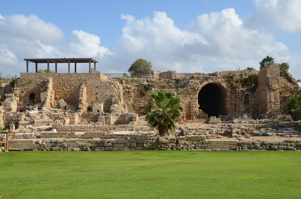 Part of the eastern wharf of the inner harbour with the podium of the Temple of Augustus and a series a vaults used as warehouses.