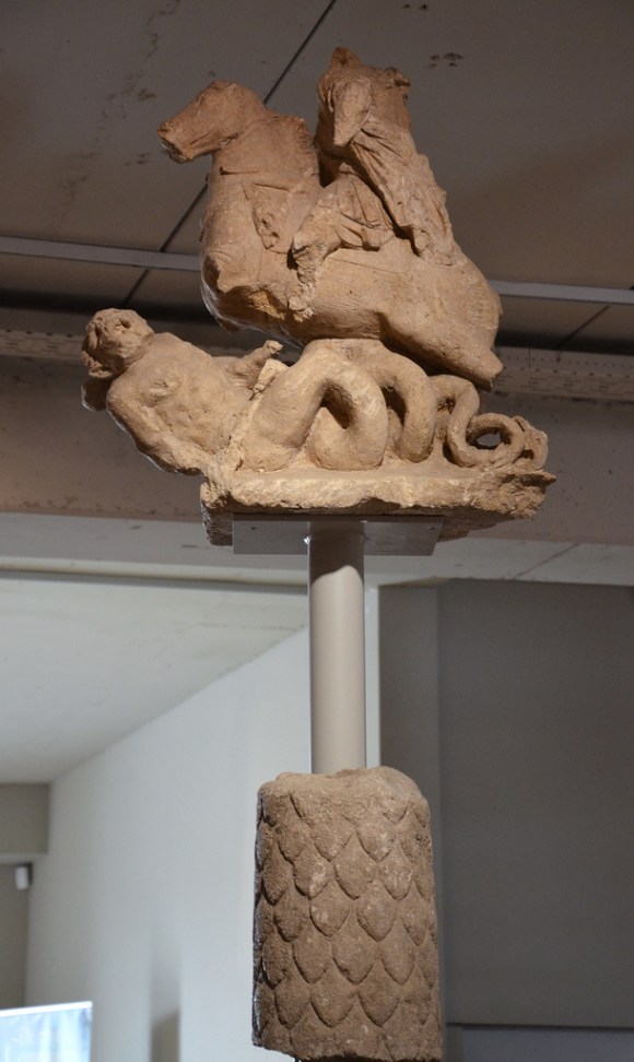 Fragments from a Jupiter Column, a statue group portraying Jupiter on horseback trampling giants with serpent bodies, 150-175 AD. Gallo-Roman Museum of Tongeren, Belgium