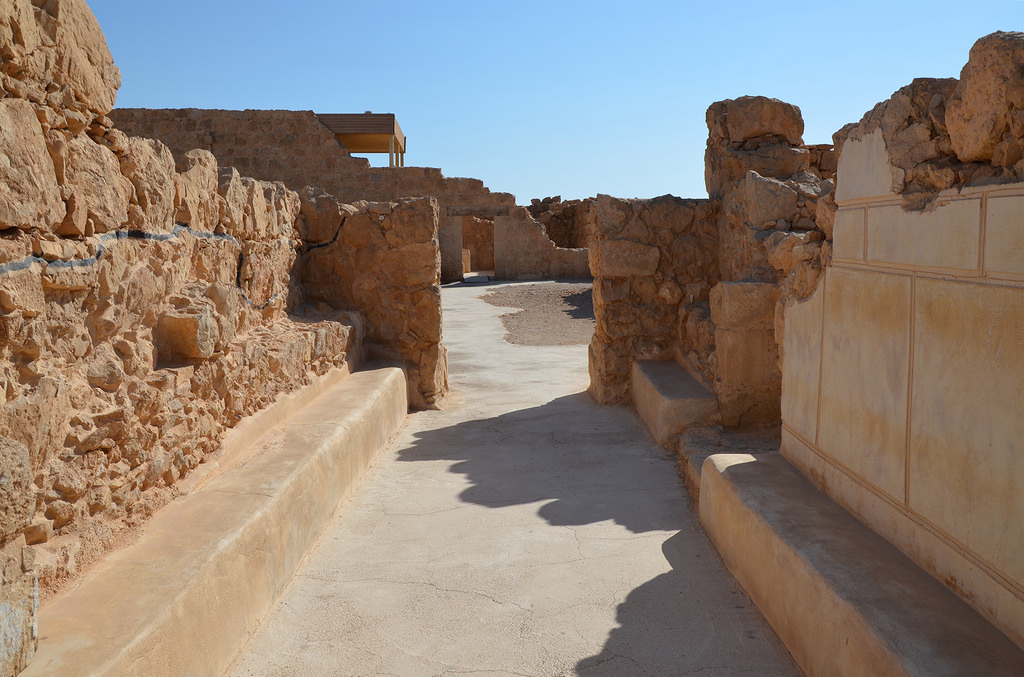 The entrance to the Western Palace with Hellenistic-style wall painting featuring painted stucco panels imitating the facings of a real wall.