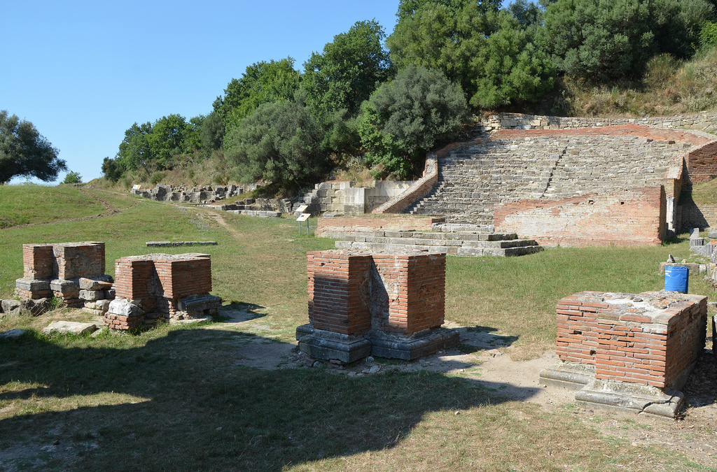 The four pillars of the Triumphal Arch in front of the Odeon. With its three arched openings the 14m long monument would have risen to a height of 10m. It was constructed of brick and formely faced with white marble slabs.