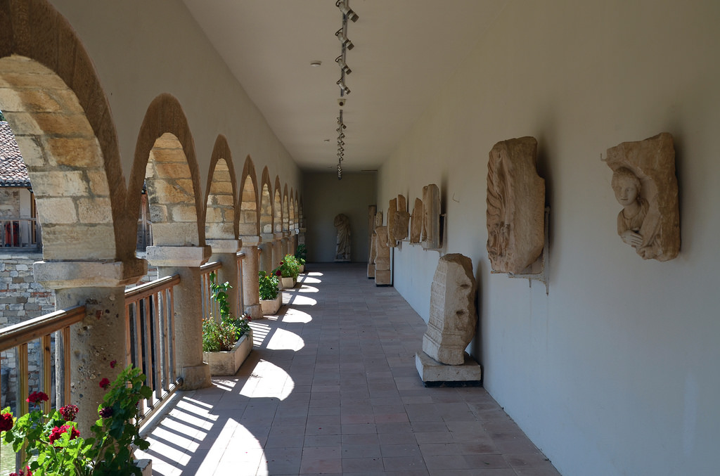 Balcony of the North wing of the museum with reliefs and statues taken from the nearby Greek Illyrian site of Apollonia, Ardenica Monastery, an Eastern Orthodox monastery near Apollonia.