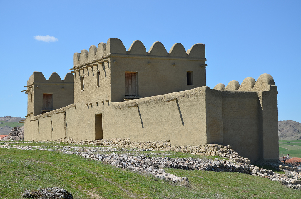 Modern reconstruction of a 65m long section of the city wall made of mud brick.