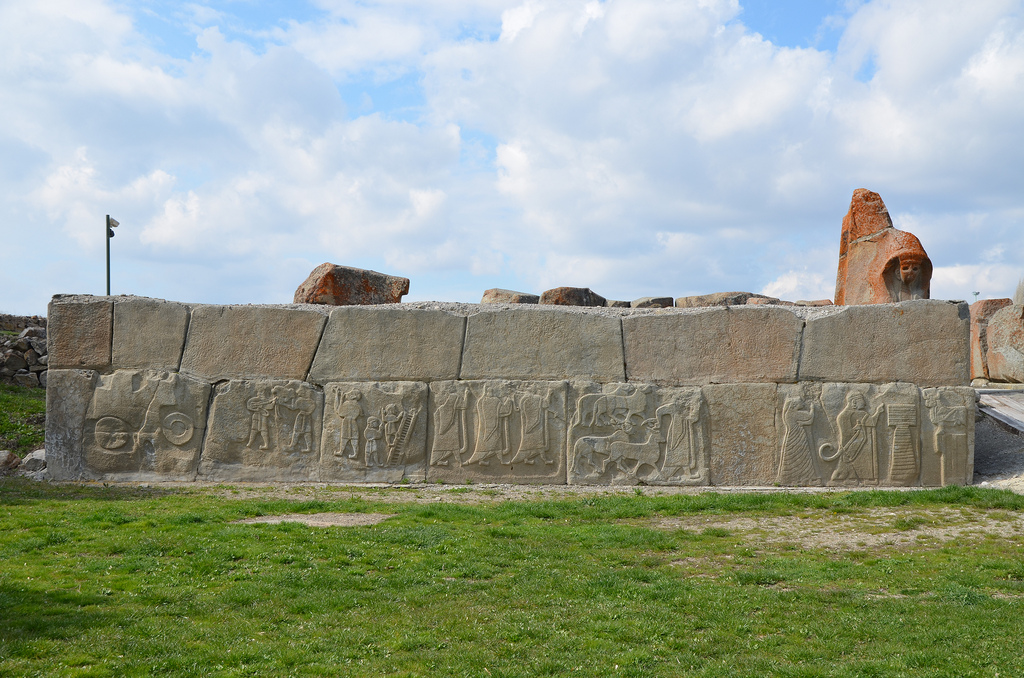 The external facade of the west tower located in front of the Sphinx Gate ornamented with relief-decorated orthostats (original reliefs in Museum of Anatolian Civilizations).