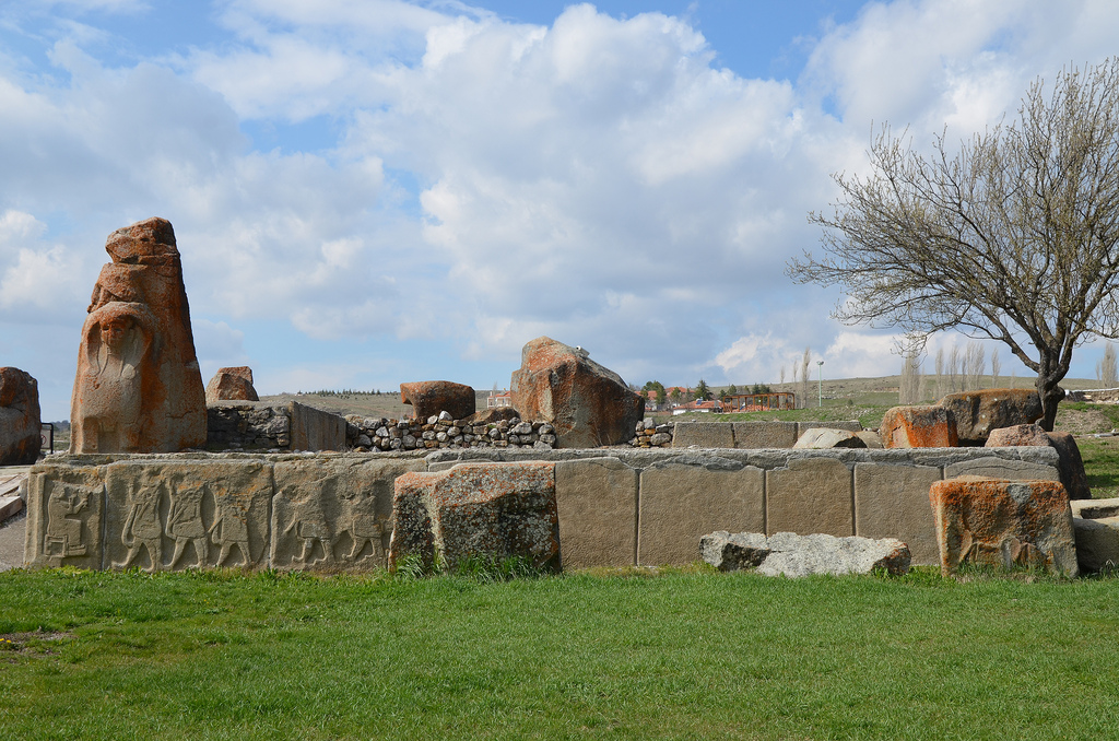 The external facade of the eastern tower located in front of the Sphinx Gate ornamented with relief-decorated orthostats (original reliefs in Museum of Anatolian Civilizations).