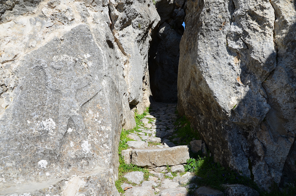 Entrance to Chamber B with a relief of a winged, lion-headed demon.