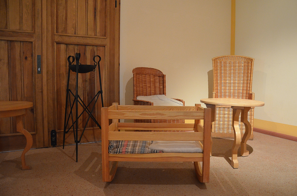 Furniture reproductions including a Roman cradle based on the one found in Herculaneum.