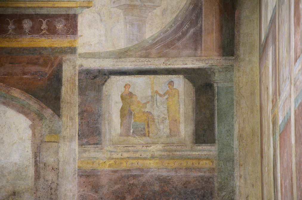 Detail of fresco on the back wall of the tablinum.