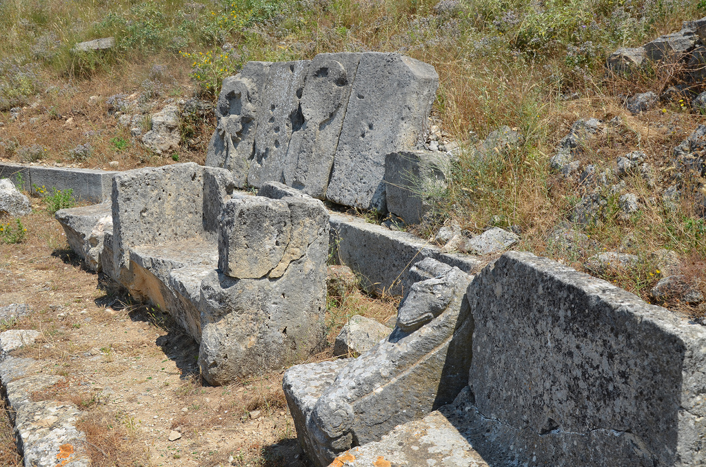 The cavea of the theatre with decorated seats.
